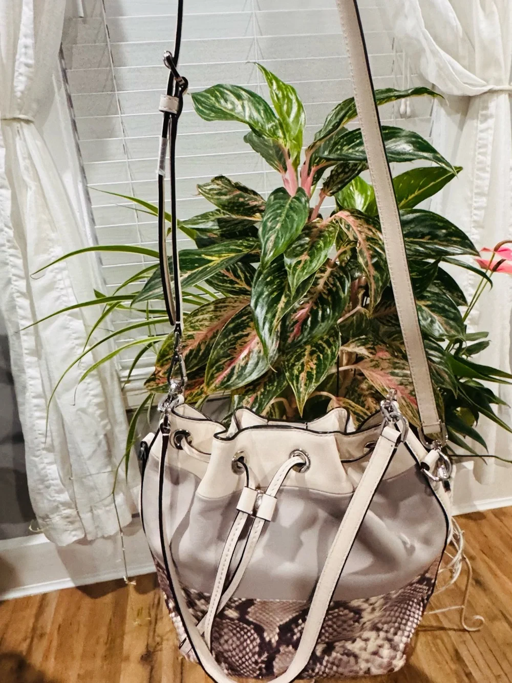 Michael Kors women’s White Drawstring Bucket Bag with Snake-Print Panel